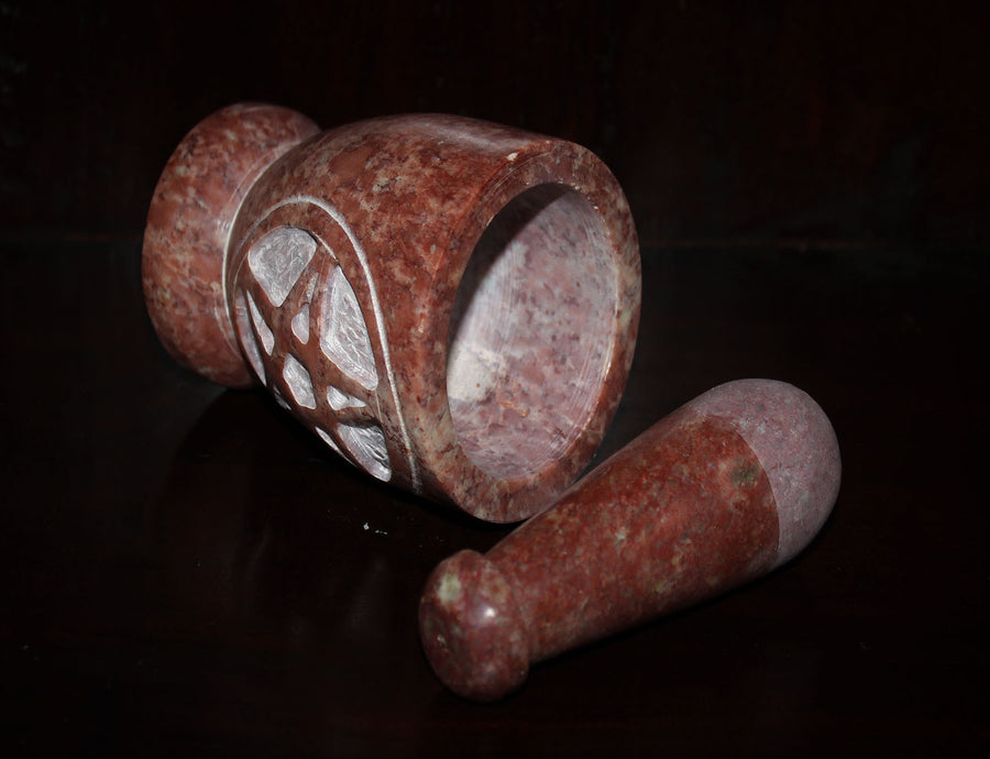 Hand-carved soapstone Mortar and Pestle used to grind your witchy herbs and reins! Hand-made in India, this Mortar and Pestle is 10 cm high and 8 cm in diameter  Please note: Due to the nature of soapstone, each item will vary in colour.